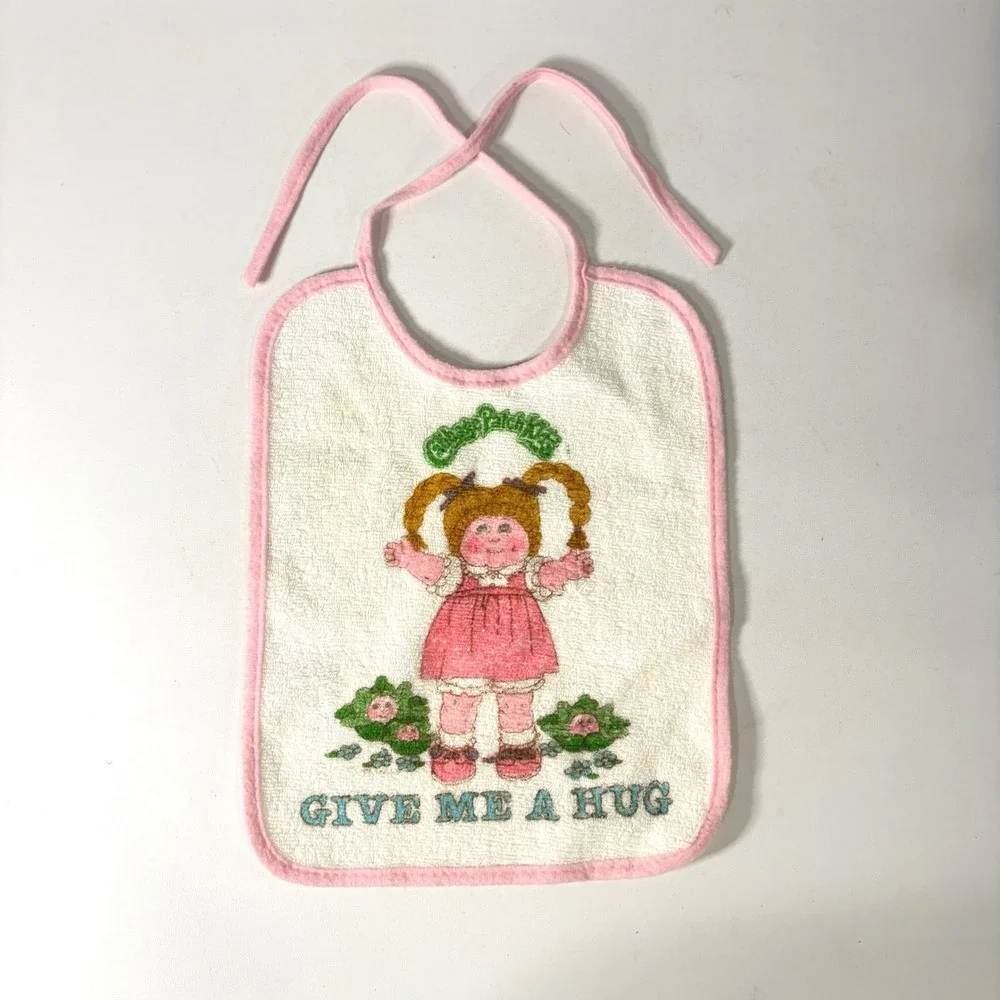 Vintage 80s Tommee Tippee Cabbage Patch Kids Bib Give Me A Hug Pink White